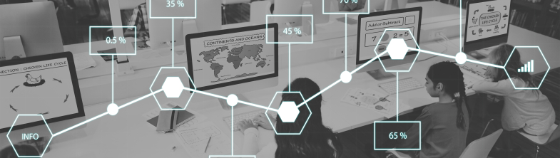 Children in a classroom, sitting in front of rows of computers. Overlaid on the image is a line graph, showing a range of percentages.