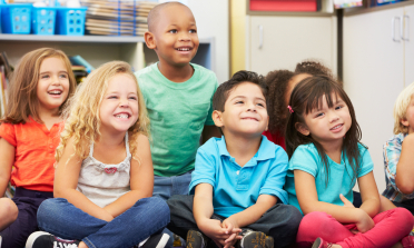 Group of primary school learners in classroom